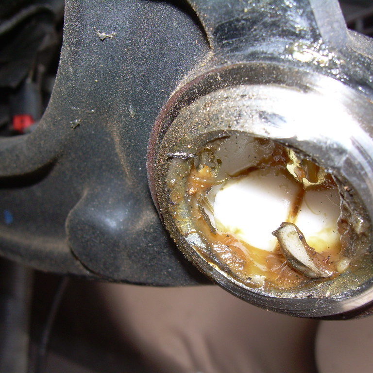 Inspecting damaged front suspension ball joint
